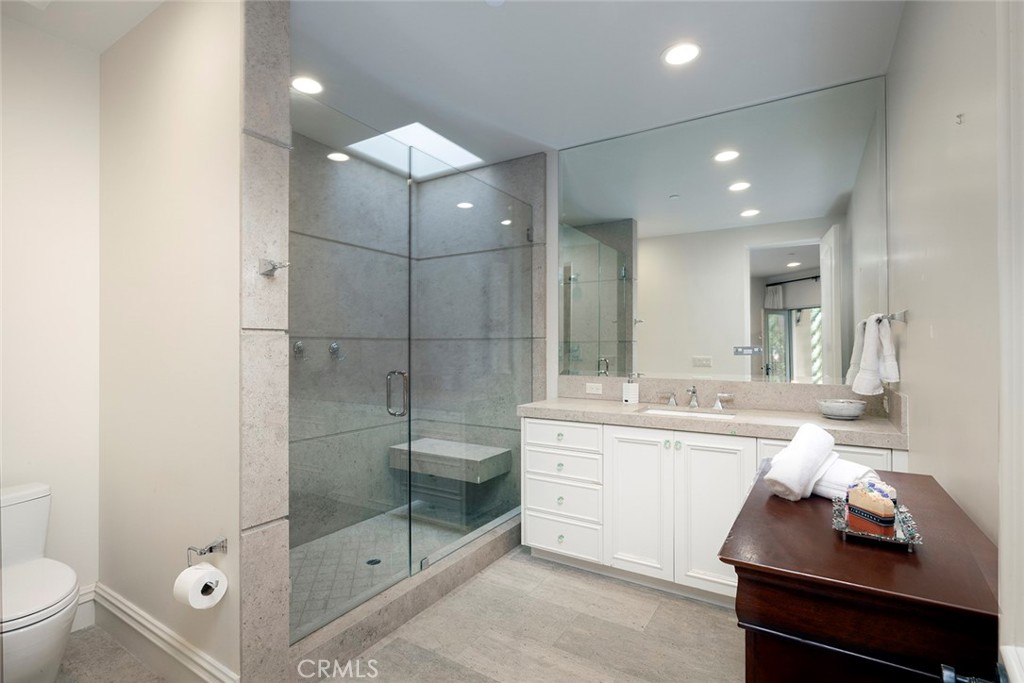 5 Sailview Newport Coast, CA 92657 - Photo 27 of 37 a bathroom with a sink a toilet and shower