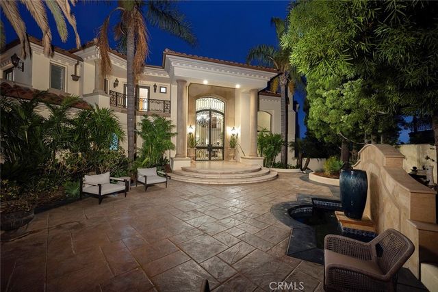 a building exterior with furniture