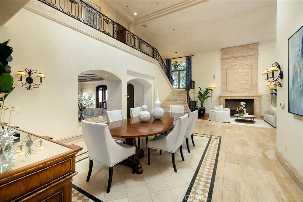 5 Sailview Newport Coast, CA 92657 - Photo 10 of 37 a view of a dining room with furniture and a chandelier