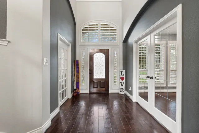 a view of gallery with wooden floor