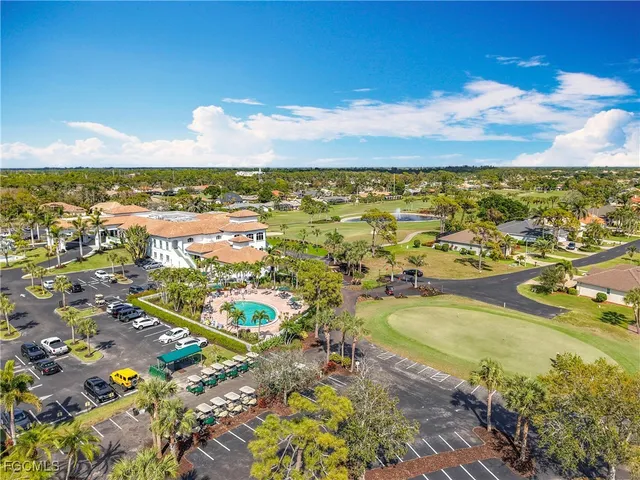 a view of a swimming pool with an ocean view