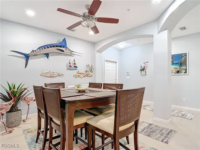 a dining room with furniture and window