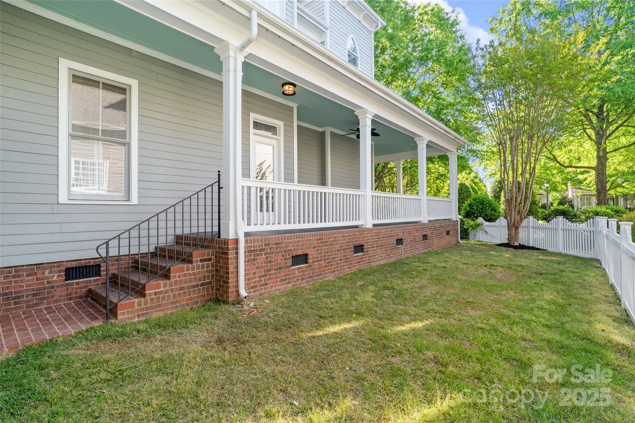 6165 Caseys Side Way Fort Mill, SC 29708 - Photo 25 of 34 a front view of a house with garden