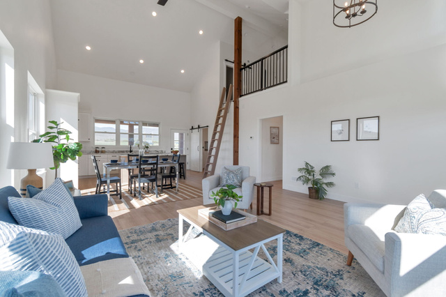 1820 West Farmhouse Flats Road Peoa, UT 84061 - Photo 63 of 79 Vaulted ceilings with recessed lighting create an airy ambiance in this open-concept living area