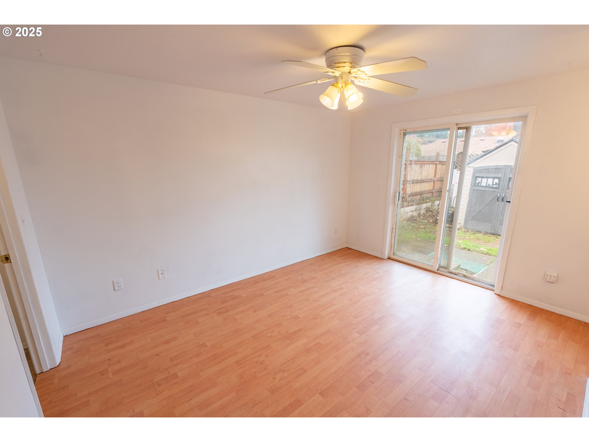 219 Northeast 18th Avenue Camas, WA 98607 - Photo 26 of 34 a view of an empty room with wooden floor and a window