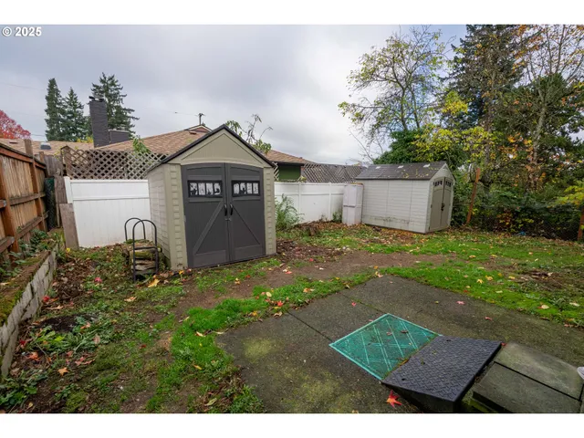 a view of a front of a house with a yard