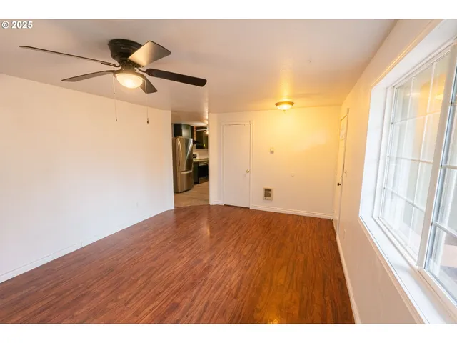a view of an empty room and window