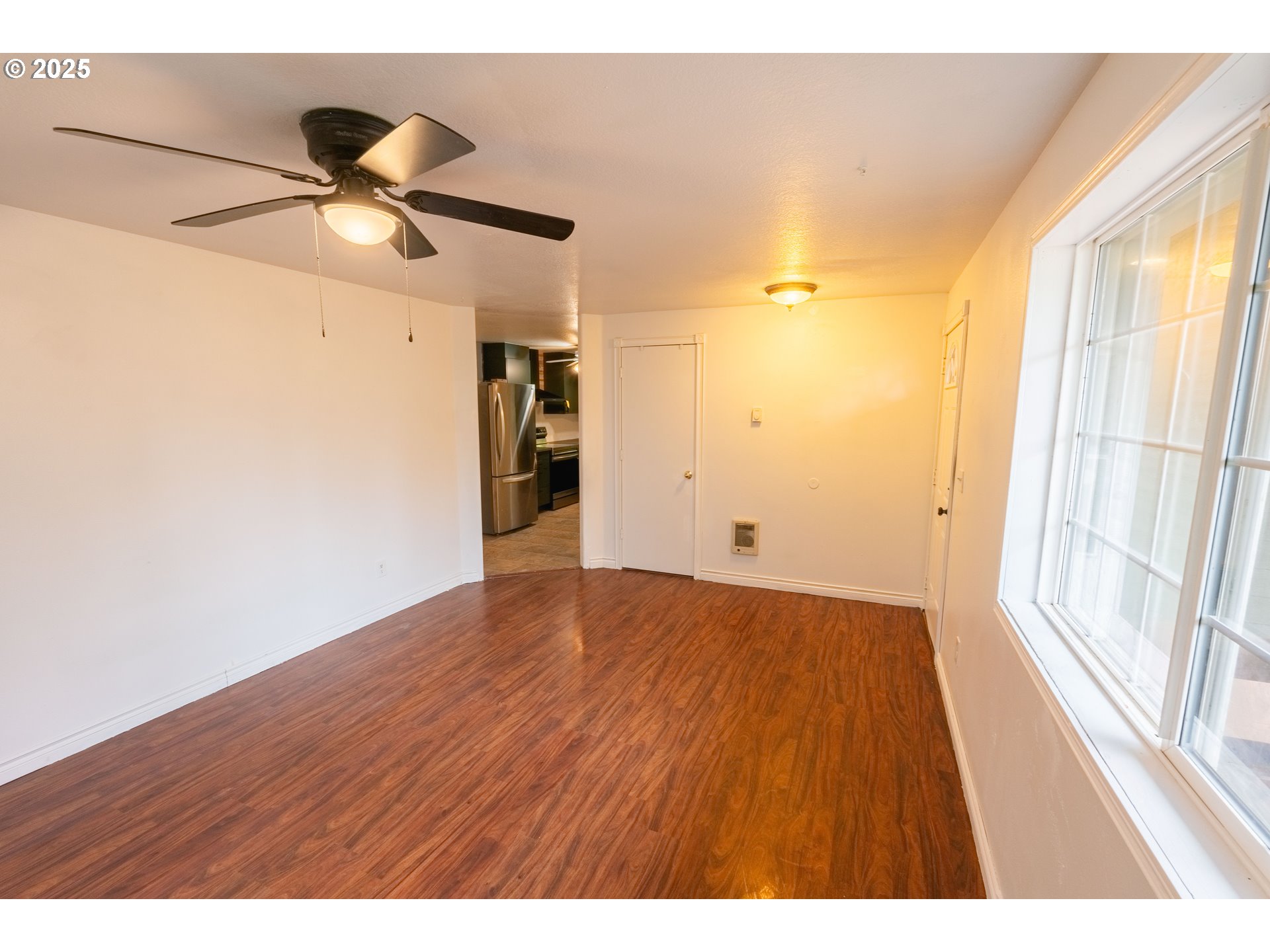 219 Northeast 18th Avenue Camas, WA 98607 - Photo 8 of 34 a view of an empty room and window