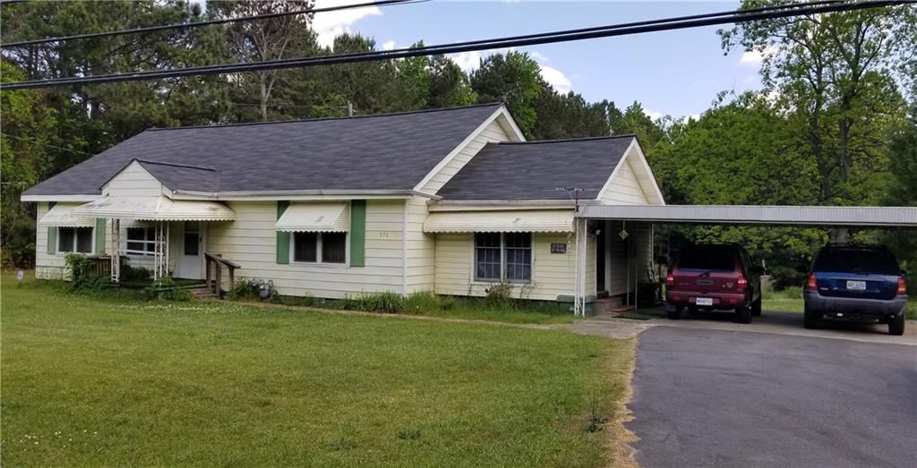 576 Auburn Road Auburn, GA 30011 - Photo 1 of 1 Front exterior. Large parking area is a bonus.