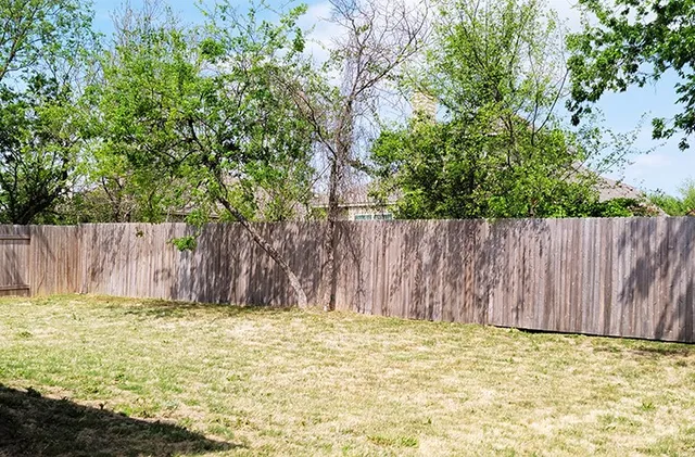 a view of a swimming pool with outdoor seating