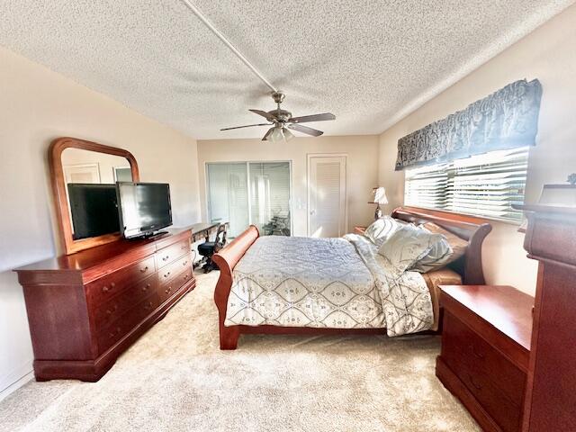 4001 Hythe A Boca Raton, FL 33434 - Photo 8 of 38 a bedroom with a bed and a flat screen tv