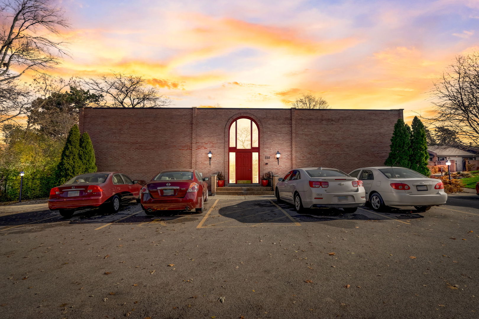 550 East Main Street, Unit 2E Barrington, IL 60010 - Photo 1 of 19 a view of street with parked cars