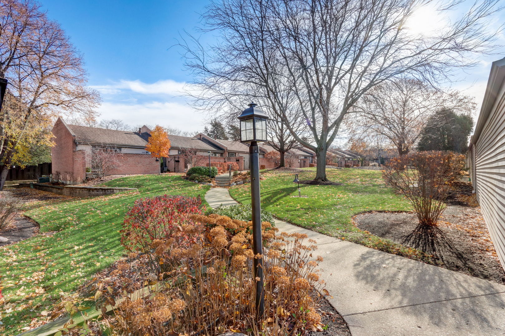 550 East Main Street, Unit 2E Barrington, IL 60010 - Photo 2 of 19 a view of a house with a yard