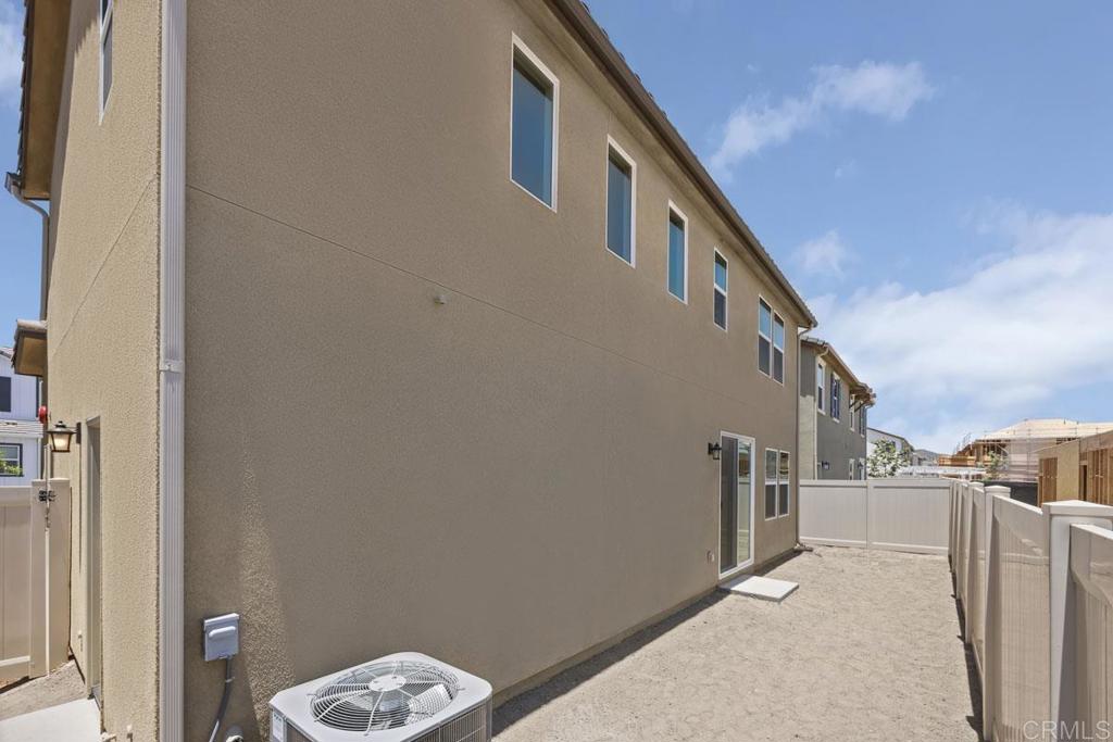 740 Kingbird Loop Oceanside, CA 92058 - Photo 18 of 23 a view of a hallway with stairs