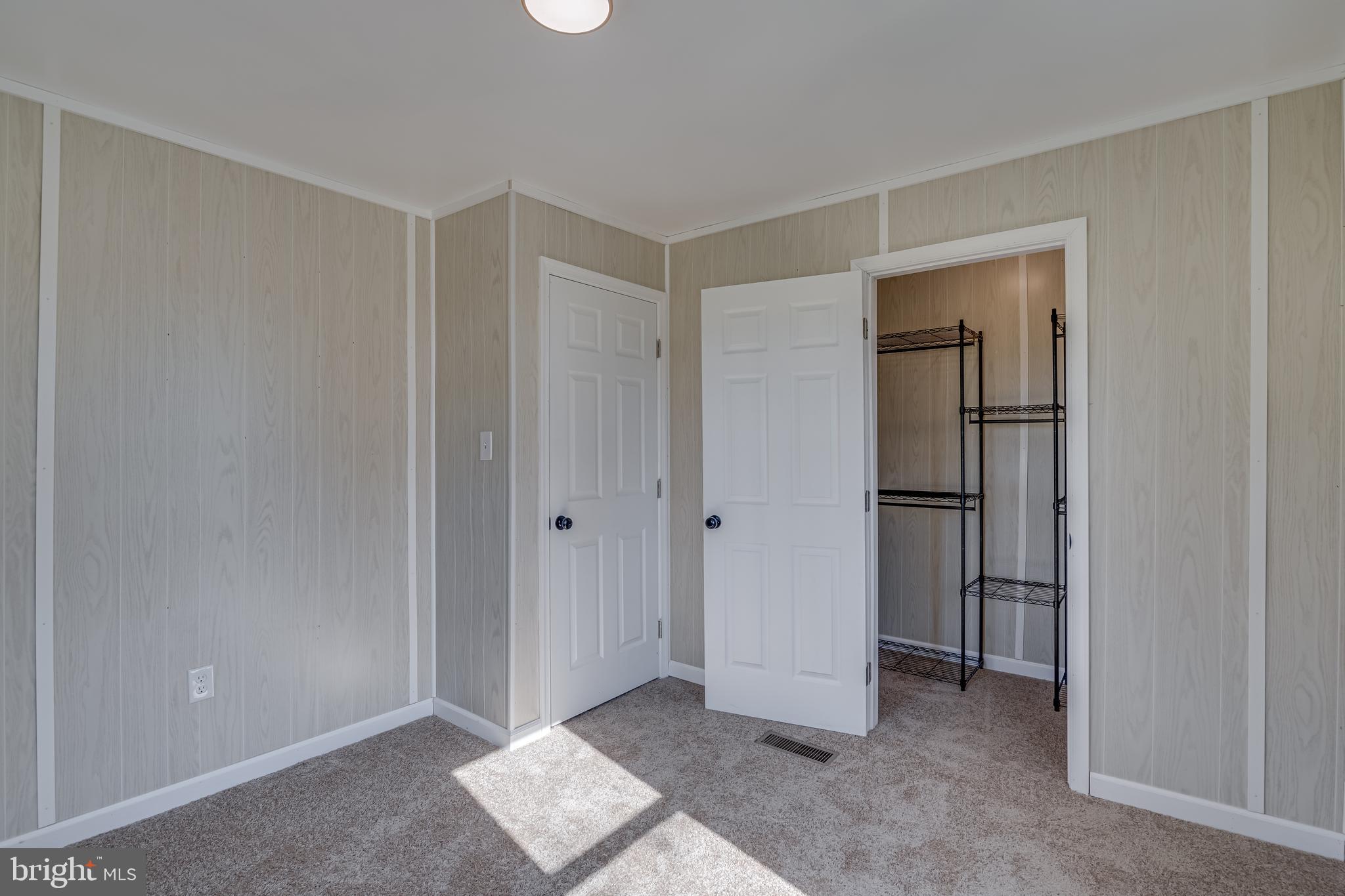 56 Clems Drive Ranson, WV 25438 - Photo 14 of 25 a view of entryway with bathroom