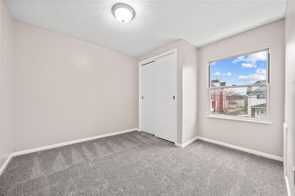 145 Lawrence Avenue Washington, PA 15301 - Photo 15 of 32 an empty room with windows
