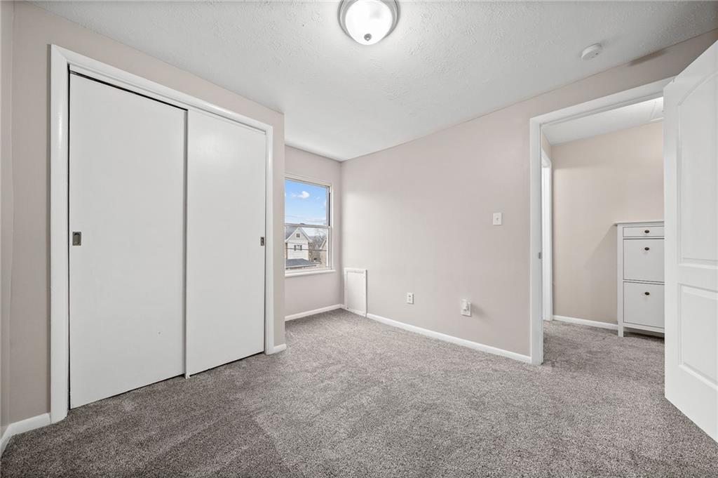 145 Lawrence Avenue Washington, PA 15301 - Photo 18 of 32 an empty room with closet and a bathroom