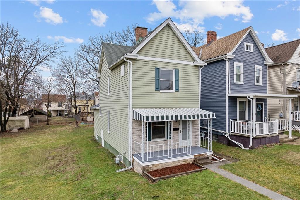 145 Lawrence Avenue Washington, PA 15301 - Photo 2 of 32 a view of a house with a yard