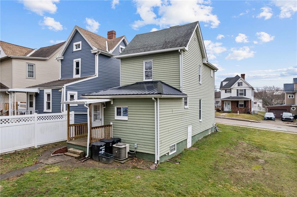145 Lawrence Avenue Washington, PA 15301 - Photo 23 of 32 a front view of a house with a yard