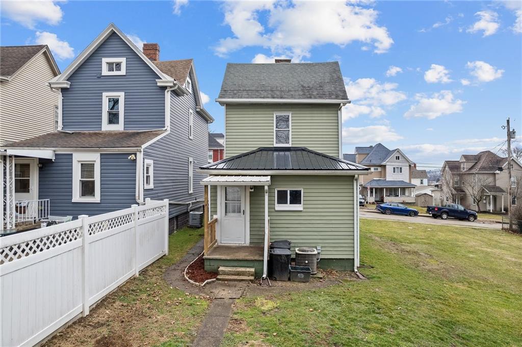 145 Lawrence Avenue Washington, PA 15301 - Photo 24 of 32 a front view of a house with a yard