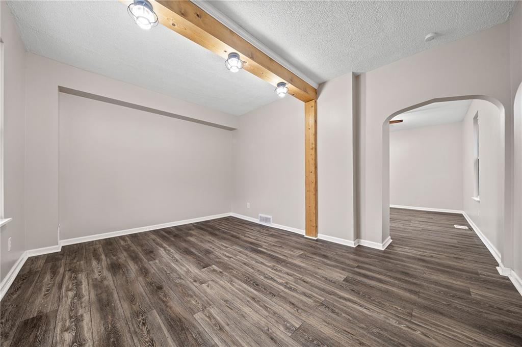 145 Lawrence Avenue Washington, PA 15301 - Photo 10 of 32 a view of an empty room with wooden floor