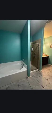 a view of a bathtub in a room