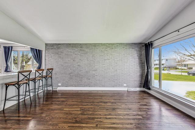 509 North Willow Road Elmhurst, IL 60126 - Photo 5 of 17 a view of dining room with furniture and wooden floor