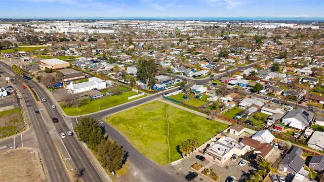 an aerial view of a pool patio swimming pool and outdoor seating
