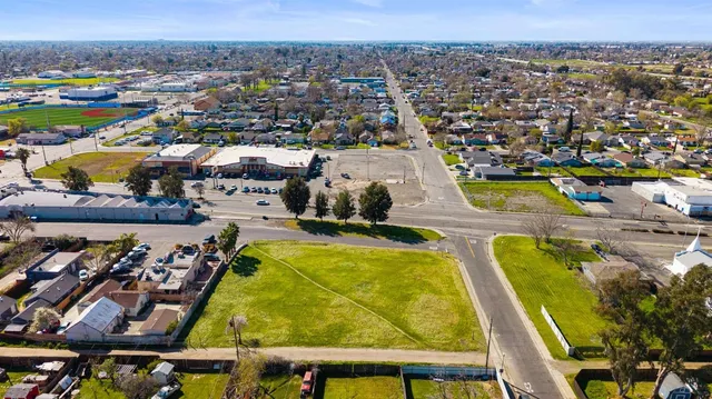 an aerial view of a residential building and lake view