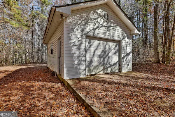 a backyard of a house with lots of green space
