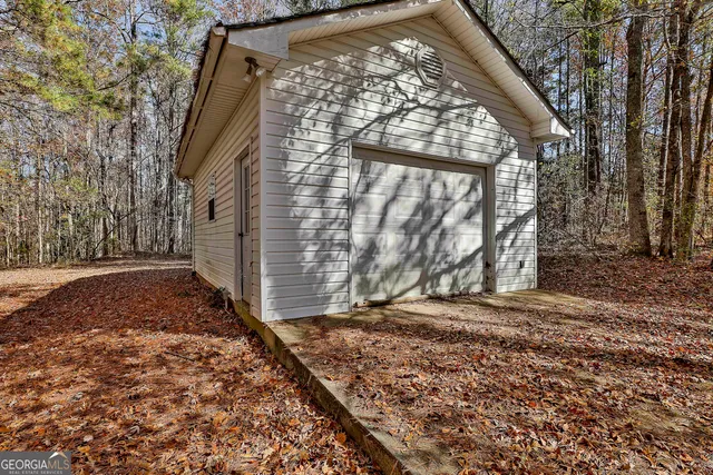 a backyard of a house with lots of green space