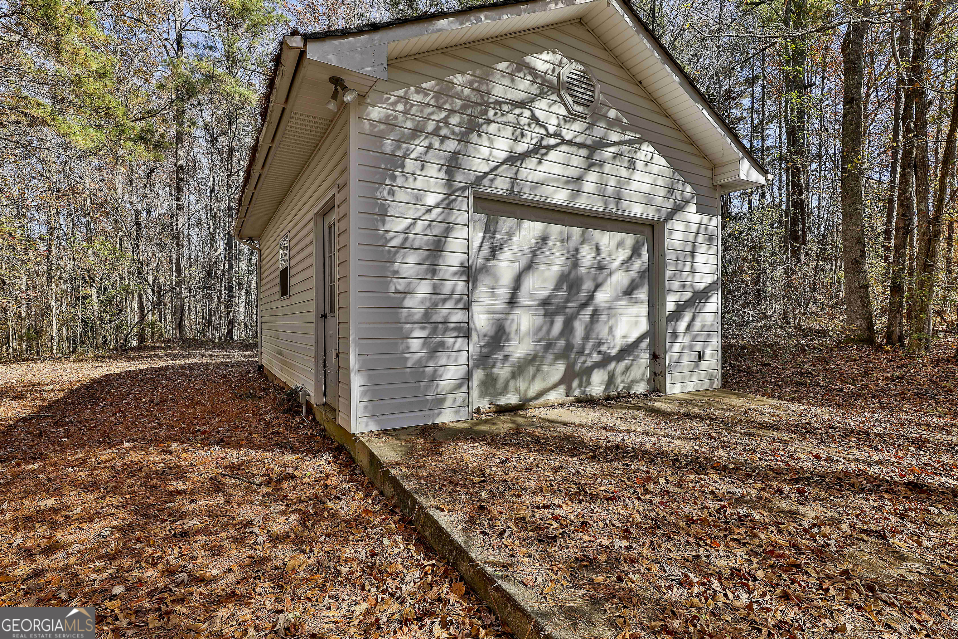 2246 Concord Road Concord, GA 30206 - Photo 14 of 18 a backyard of a house with lots of green space