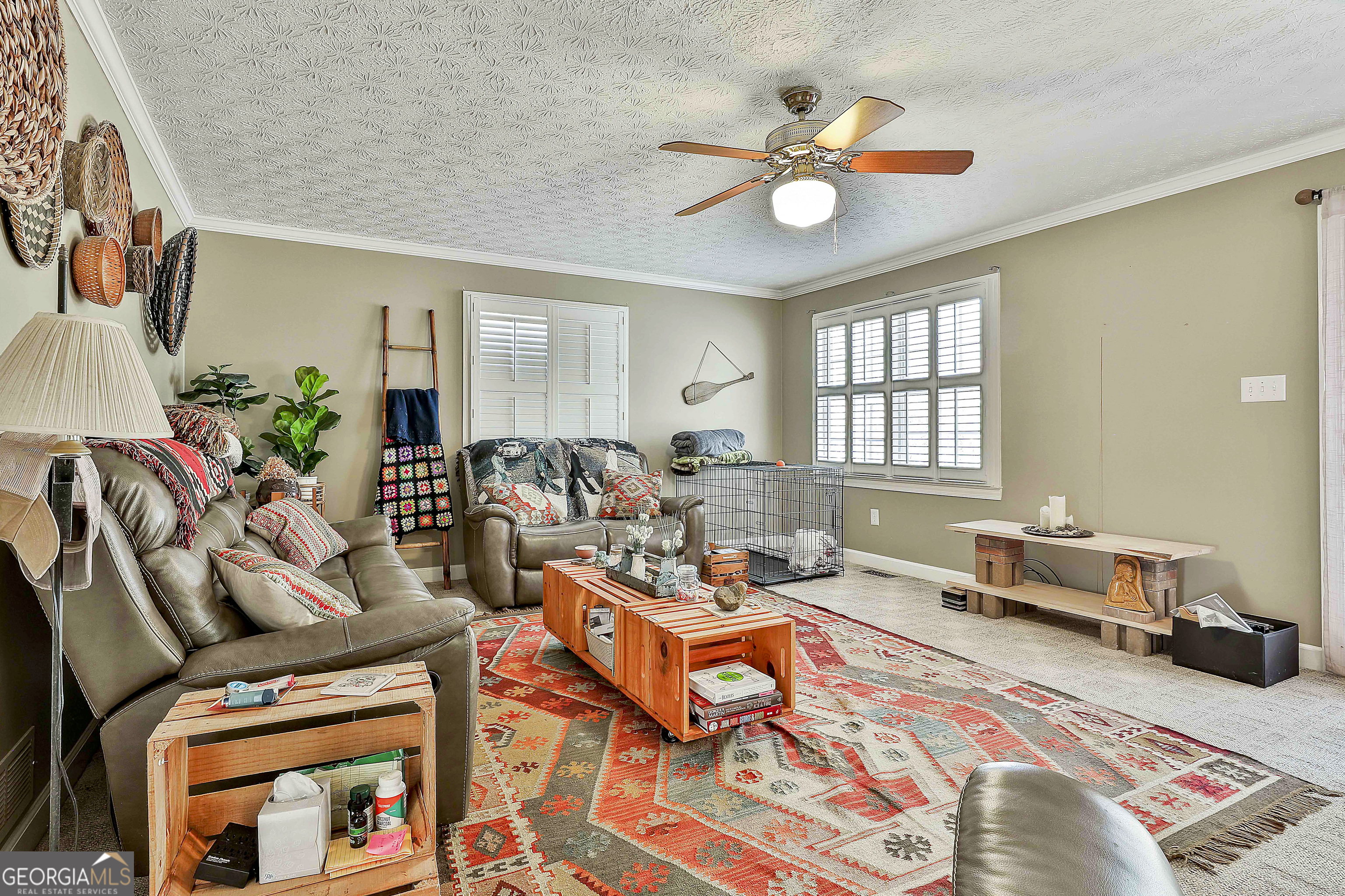 2246 Concord Road Concord, GA 30206 - Photo 16 of 18 a living room with furniture and a chandelier