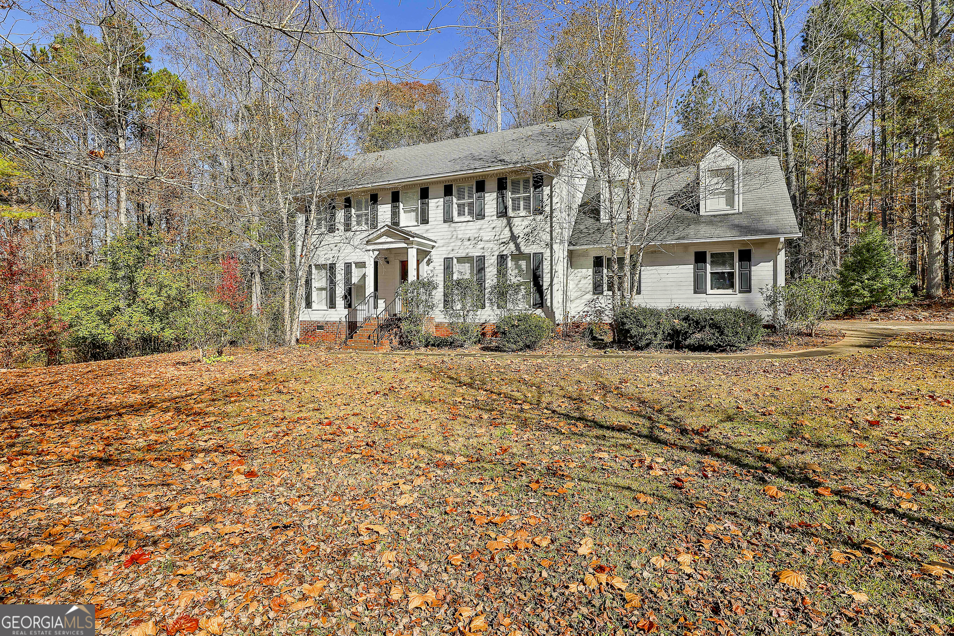 2246 Concord Road Concord, GA 30206 - Photo 2 of 18 a front view of a house with a yard