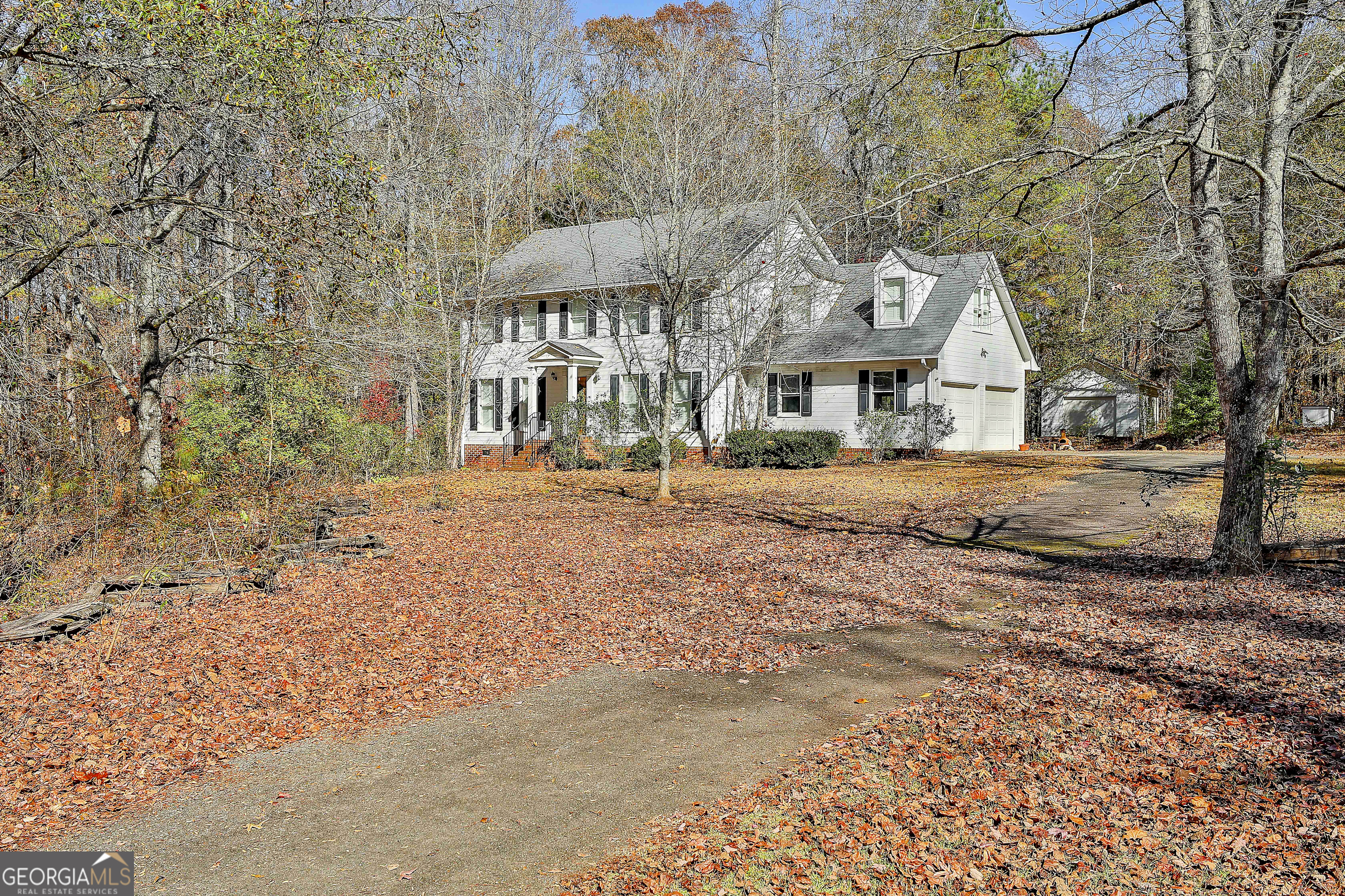 2246 Concord Road Concord, GA 30206 - Photo 3 of 18 a front view of a house with a yard