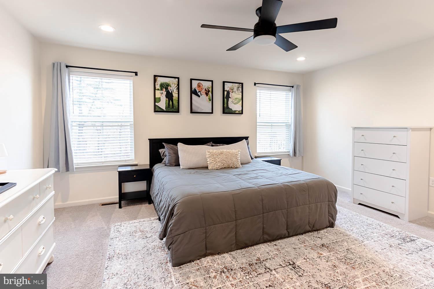 204 Whitetail Circle Mill Hall, PA 17751 - Photo 14 of 33 a bedroom with a large bed and a window