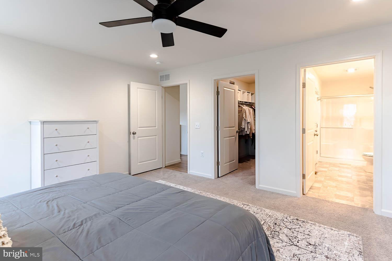 204 Whitetail Circle Mill Hall, PA 17751 - Photo 15 of 33 a bedroom with a bed and a walk in closet