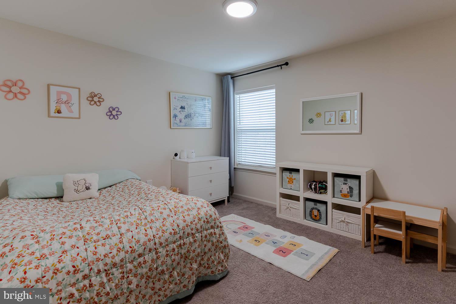 204 Whitetail Circle Mill Hall, PA 17751 - Photo 18 of 33 a bedroom with a bed and a book shelf