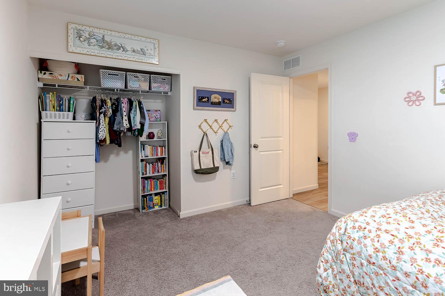 204 Whitetail Circle Mill Hall, PA 17751 - Photo 19 of 33 a view of walk in closet with clothes and shoes