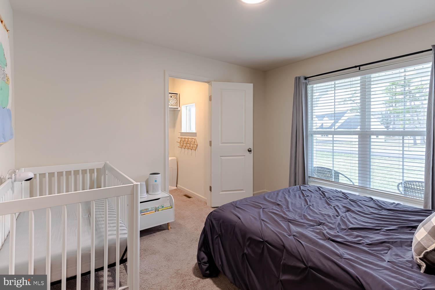 204 Whitetail Circle Mill Hall, PA 17751 - Photo 21 of 33 a bedroom with a bed and a window