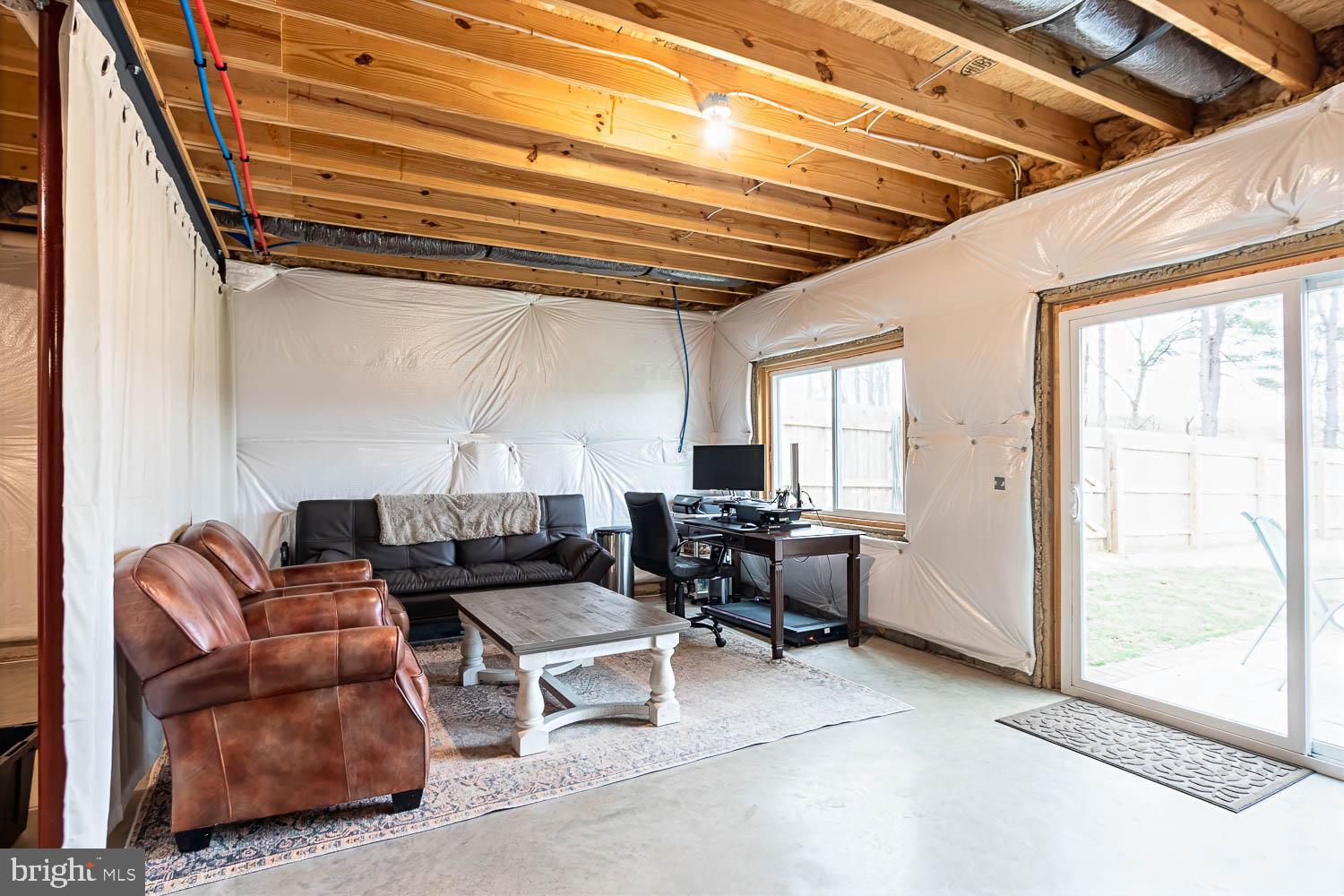204 Whitetail Circle Mill Hall, PA 17751 - Photo 28 of 33 a living room with furniture and a large window