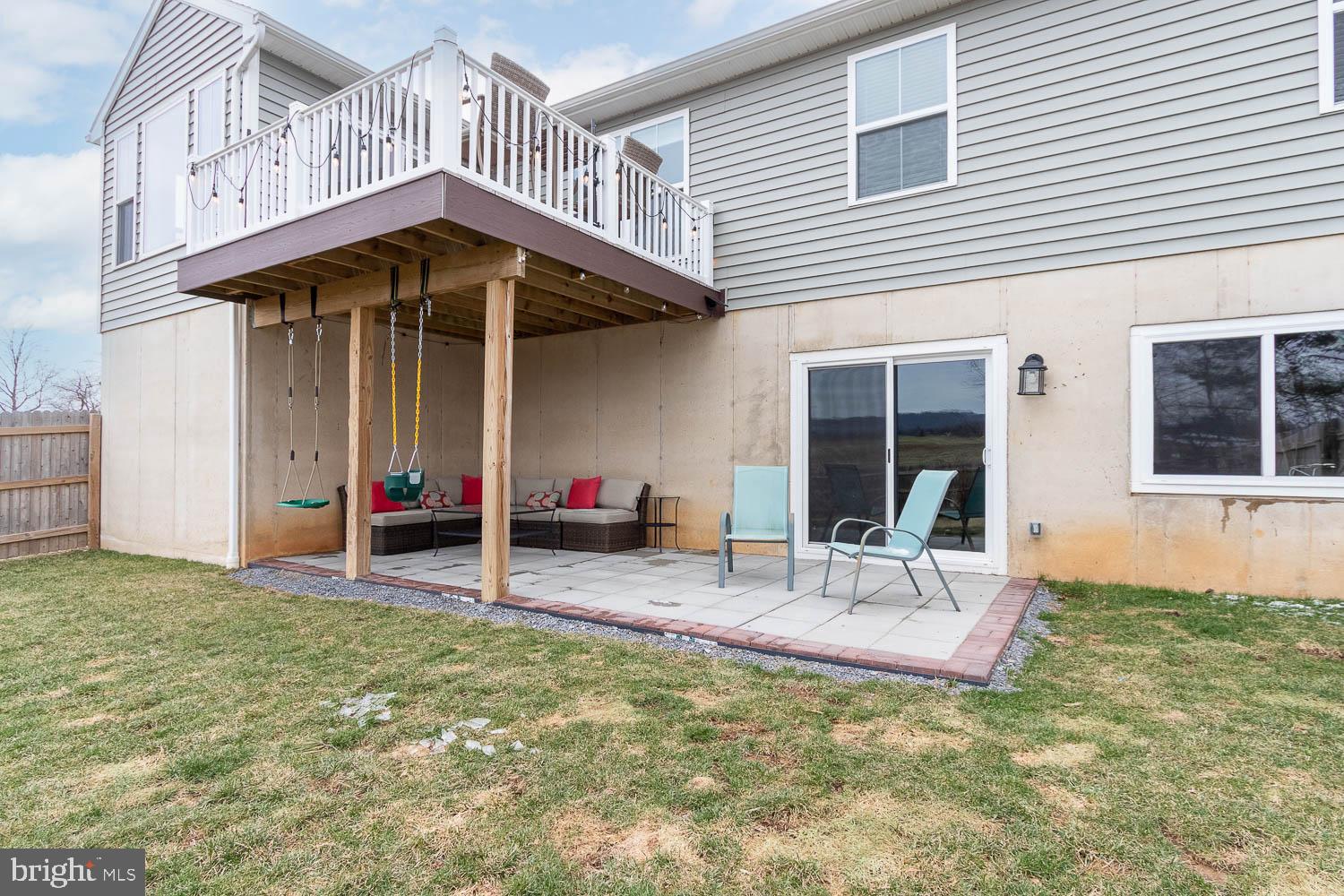 204 Whitetail Circle Mill Hall, PA 17751 - Photo 29 of 33 a view of a house with a patio and a yard