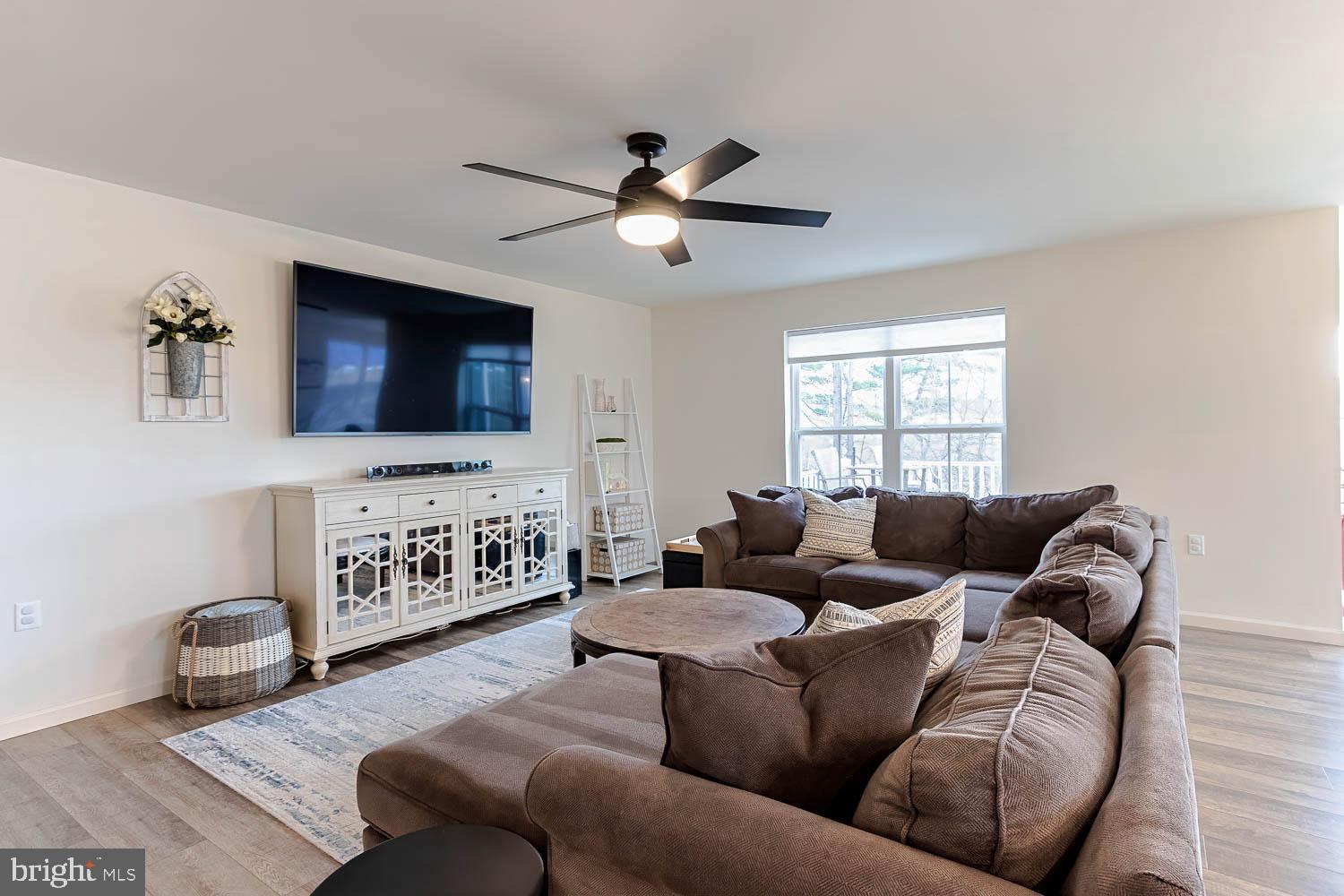 204 Whitetail Circle Mill Hall, PA 17751 - Photo 4 of 33 a living room with furniture and a flat screen tv