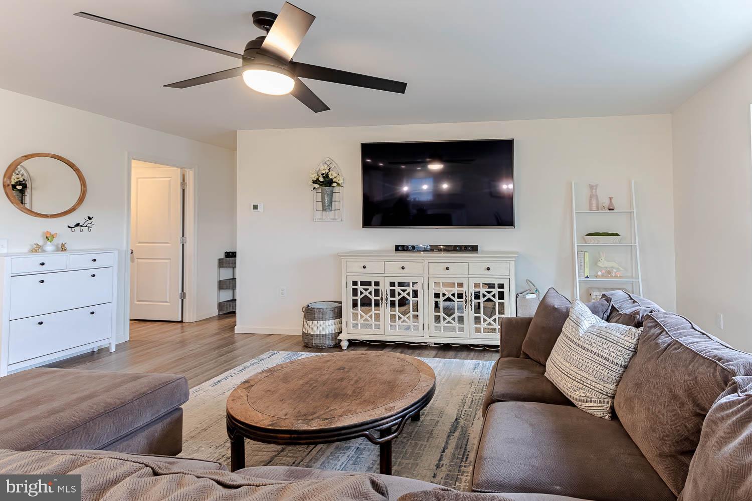 204 Whitetail Circle Mill Hall, PA 17751 - Photo 6 of 33 a living room with furniture and a flat screen tv