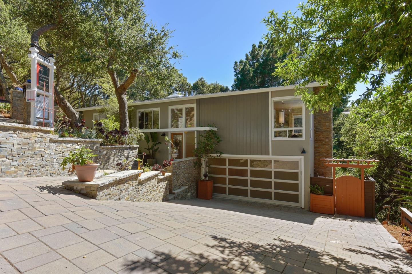39 Colorados Drive Millbrae, CA 94030 - Photo 1 of 49 a front view of a house with garage