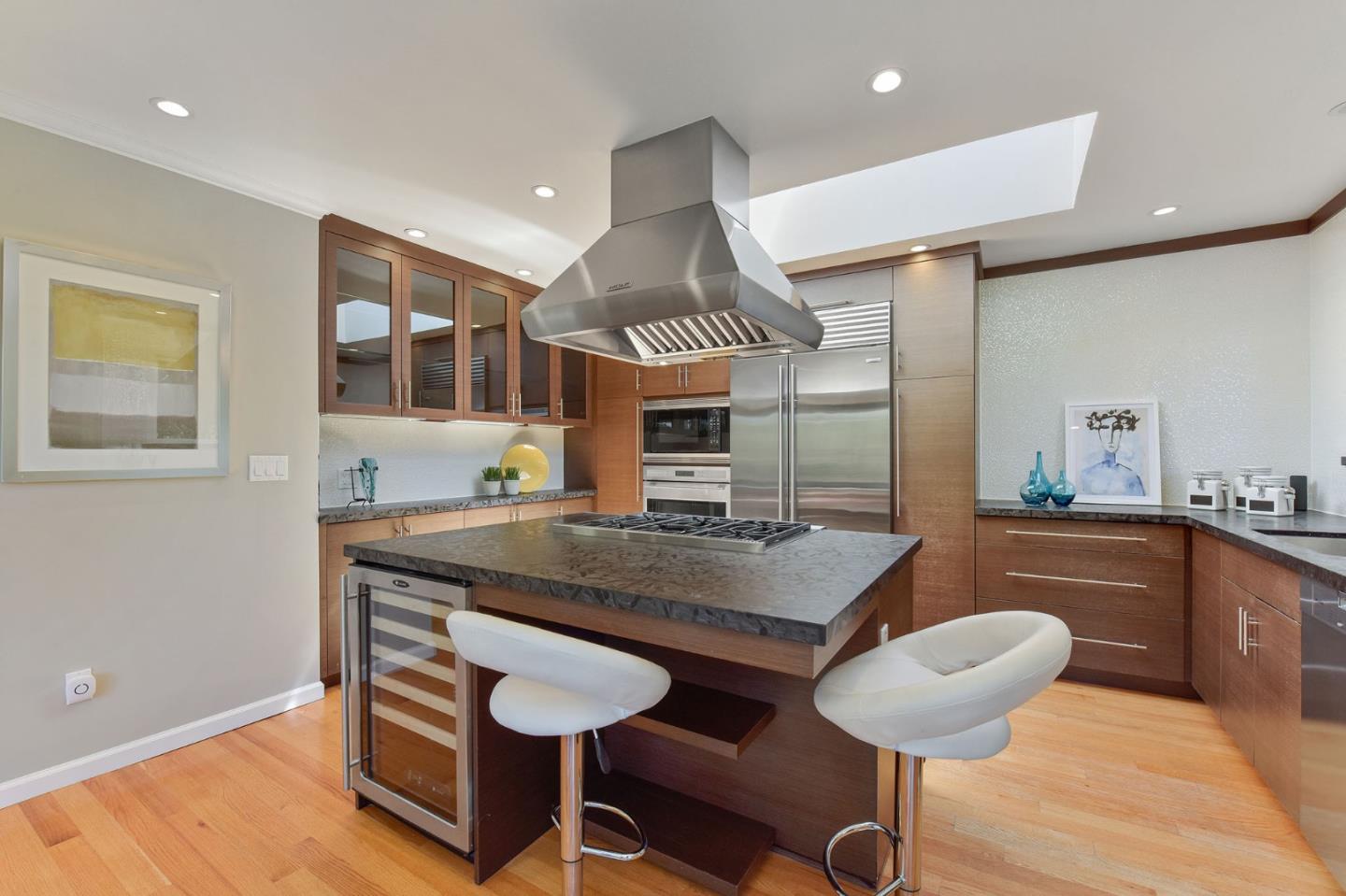 39 Colorados Drive Millbrae, CA 94030 - Photo 12 of 49 a kitchen with a table and chairs in it