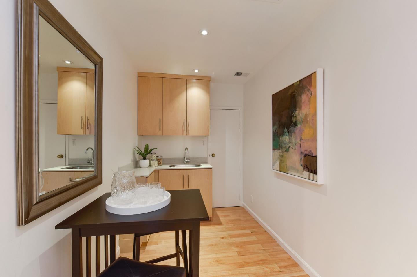 39 Colorados Drive Millbrae, CA 94030 - Photo 19 of 49 a kitchen with a table and chairs in it