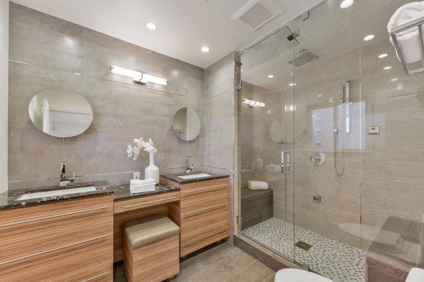 39 Colorados Drive Millbrae, CA 94030 - Photo 22 of 49 a bathroom with a double vanity sink and a mirror