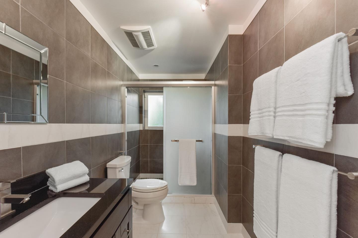 39 Colorados Drive Millbrae, CA 94030 - Photo 30 of 49 a bathroom with a sink and a mirror