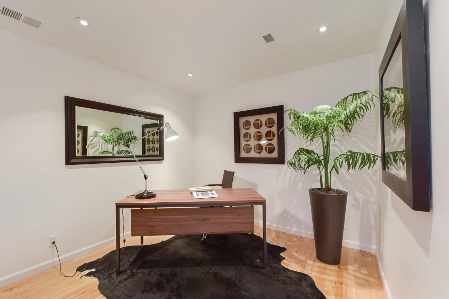 39 Colorados Drive Millbrae, CA 94030 - Photo 31 of 49 a living room with furniture and a potted plant